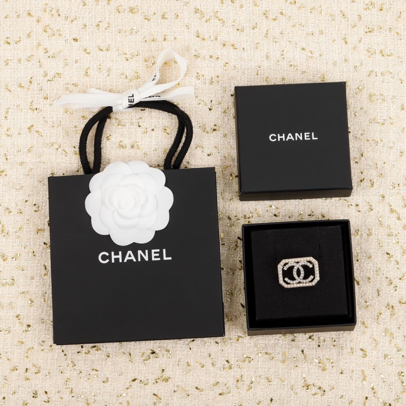 Ch*el brooches